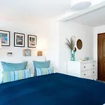 Toparti Villa, Koezvetlen Vizkapcsolattal